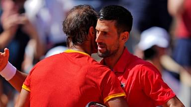 Novak Djokovic (SRB) shakes hands with Rafael Nadal (ESP) after their match in the mens tennis sinlges first round during the Paris 2024 Olympic Summer Games at Stade Roland Garros.