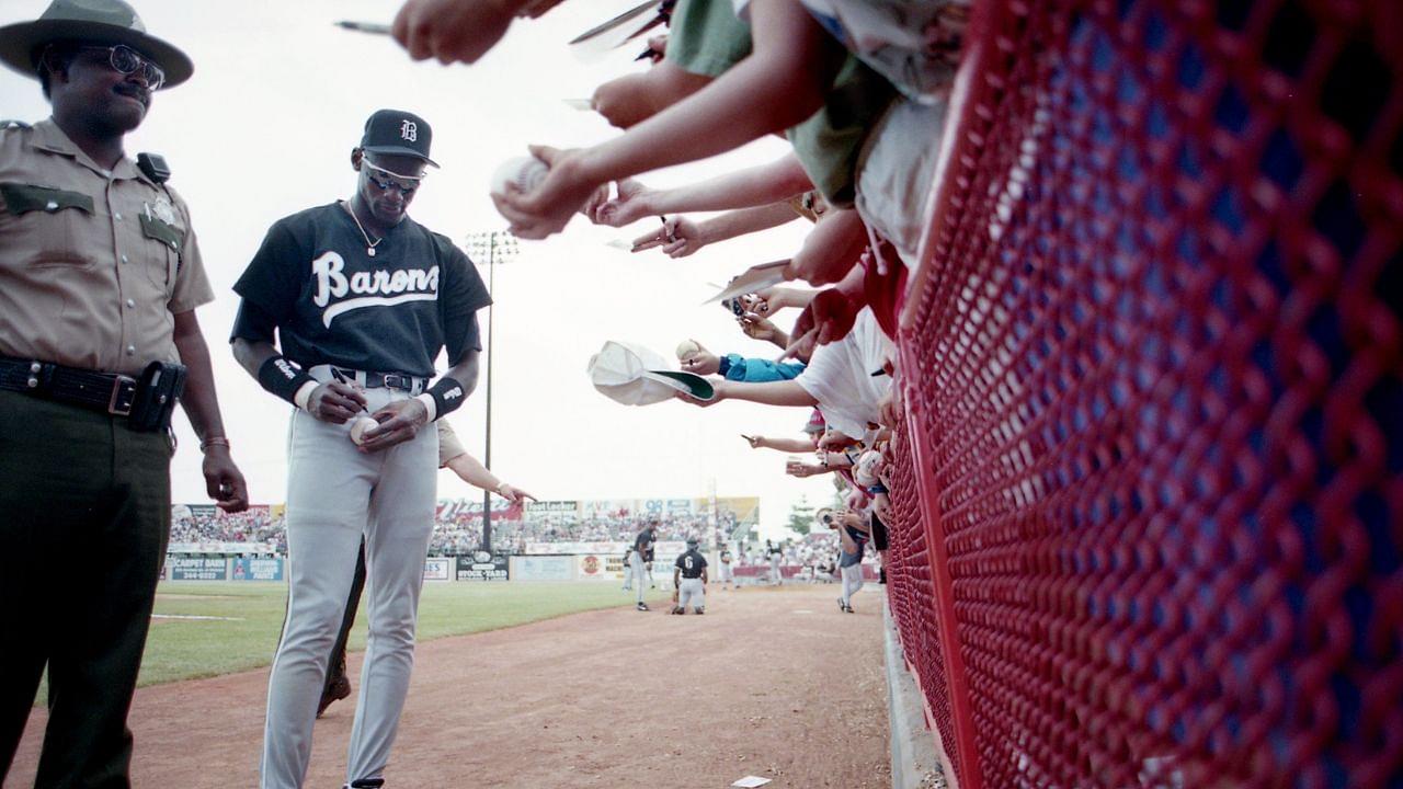 Michael Jordan signing autographs