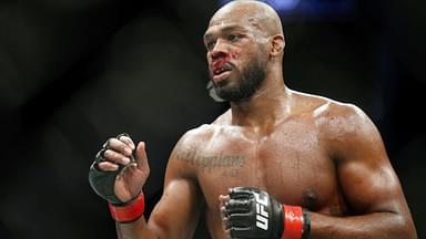 Jon Jones (red gloves) fights Dominick Reyes (not pictured) during UFC 247 at Toyota Center.