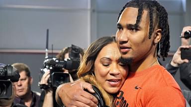 Ohio State quarterback C.J. Stroud hugs his mother, Kim, after his workout on the Buckeyes' pro day. CJ Stroud