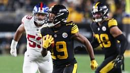 Pittsburgh Steelers wide receiver Calvin Austin III (19) scores a touchdown on a seventy-five yard punt return against the New York Giants during the third quarter at Acrisure Stadium.