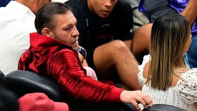 Irish mixed martial artist Conor McGregor looks on during the first half in game four of the 2023 NBA Finals between the Miami Heat and the Denver Nuggets at Kaseya Center.