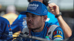 Kyle Larson looks at a screen prior to qualifying at Darlington Raceway.