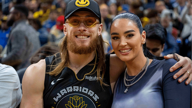 San Francisco 49ers tight end George Kittle and wife Claire Kittle at a game between Golden State Warriors and Philadelphia 76ers during the second quarter at Chase Center.