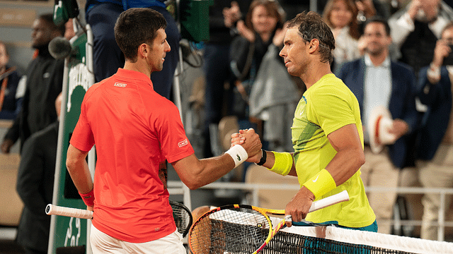 Rafael Nadal (ESP) at the net with Novak Djokovic (SRB) after their match on day 10 of the French Open at Stade Roland-Garros.