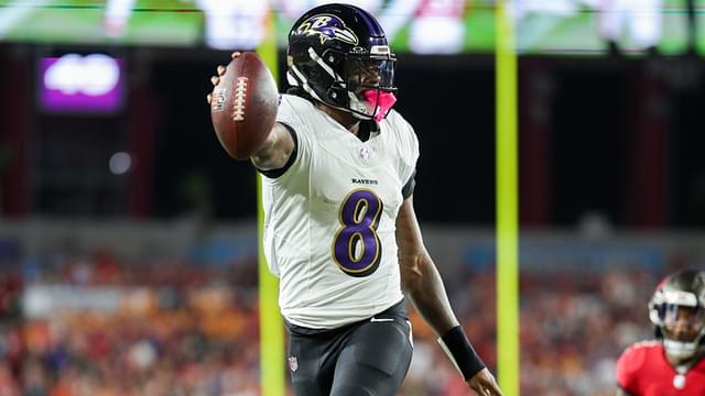 Oct 21, 2024; Tampa, Florida, USA; Baltimore Ravens quarterback Lamar Jackson (8) runs with the ball against the Tampa Bay Buccaneers in the second quarter at Raymond James Stadium.