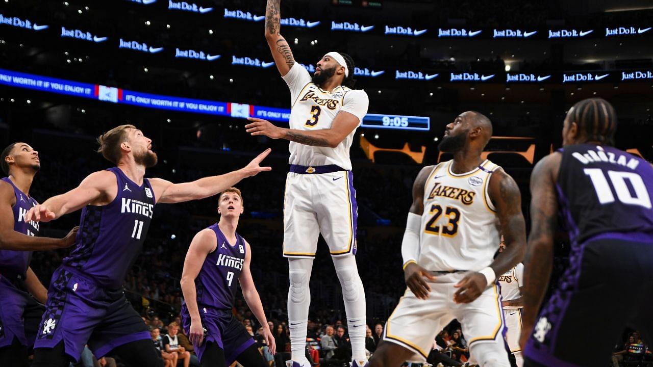 Oct 26, 2024; Los Angeles, California, USA; Los Angeles Lakers forward Anthony Davis (3) shoots against Sacramento Kings forward Domantas Sabonis (11) during the second half at Crypto.com Arena. Mandatory Credit: Jonathan Hui-Imagn Images