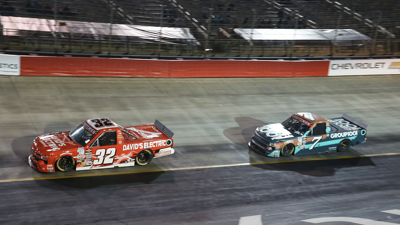 NASCAR Gander RV and Outdoors Truck Series driver Bret Holmes (32) and driver Kyle Busch (7) during the NASCAR Weather Guard truck race at Bristol Motor Speedway.