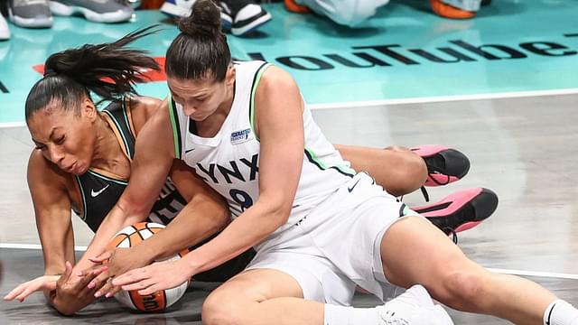 New York Liberty forward Betnijah Laney-Hamilton (44) and Minnesota Lynx forward Cecilia Zandalasini (9) fight for a loose ball