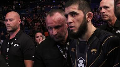 Islam Makhachev (red gloves) celebrates after defeating Alexander Volkanovski (not pictured) for the lightweight championship during UFC 284 at RAC Arena.