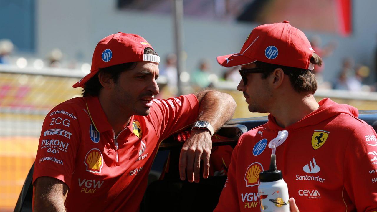 Carlos Sainz and Charles Leclerc have a conversation at the driver s parade