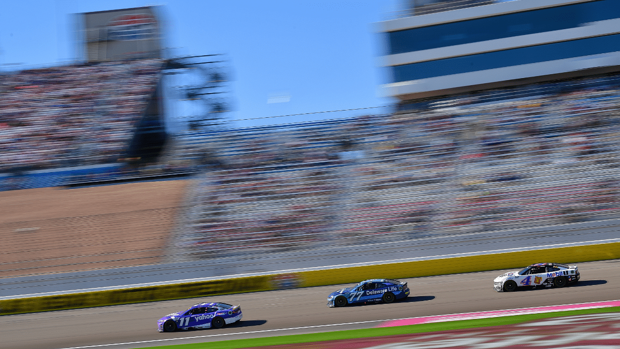 NASCAR Cup Series driver Denny Hamlin (11) leads driver Carson Hocevar (77) and driver Josh Berry (4) during the South Point 400 at Las Vegas Motor Speedway.