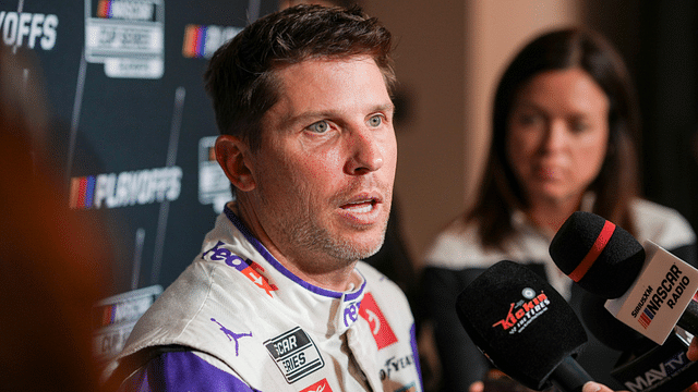 Denny Hamlin speaks to media members during the NASCAR Playoffs Media Day at the Charlotte Convention Center.