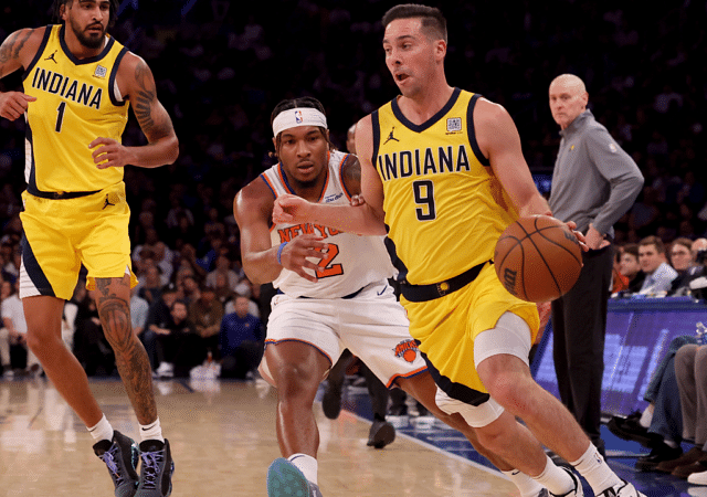 Oct 25, 2024; New York, New York, USA; Indiana Pacers guard T.J. McConnell (9) drives to the basket against New York Knicks guard Miles McBride (2) during the second quarter at Madison Square Garden. Mandatory Credit: Brad Penner-Imagn Images