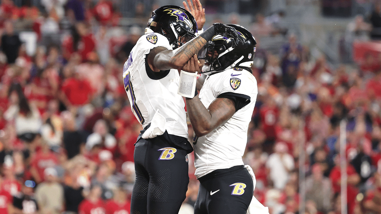 Oct 21, 2024; Tampa, Florida, USA; Baltimore Ravens wide receiver Rashod Bateman (7) is congratulated by quarterback Lamar Jackson (8) after he scored a touchdown against the Tampa Bay Buccaneers during the second half at Raymond James Stadium.