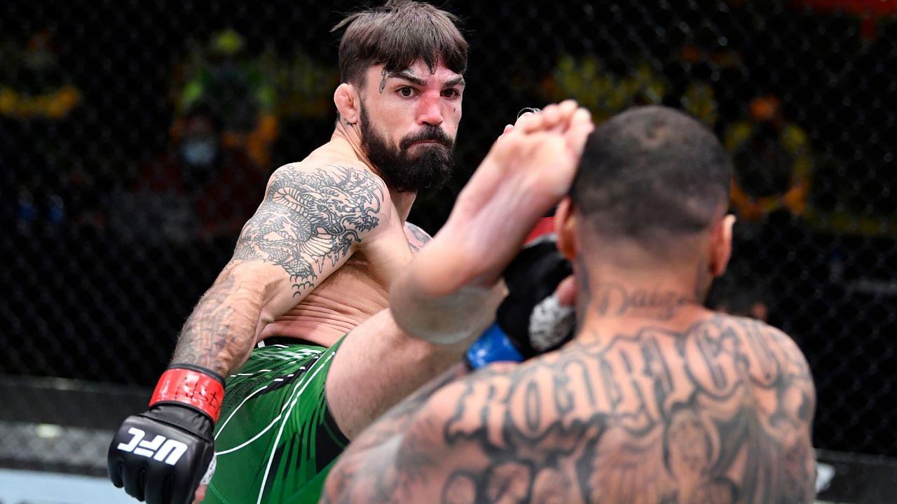 Mike Perry kicks Daniel Rodriguez in a welterweight fight during the UFC Fight Night event at UFC APEX on April 10, 2021 in Las Vegas, Nevada.