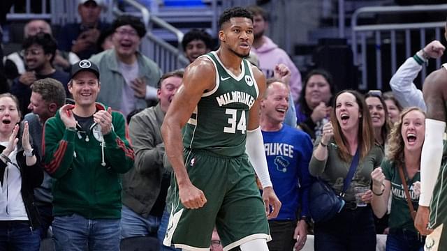 Milwaukee Bucks forward Giannis Antetokounmpo (34) after dunking the ball against the Chicago Bulls in the first half at Fiserv Forum.