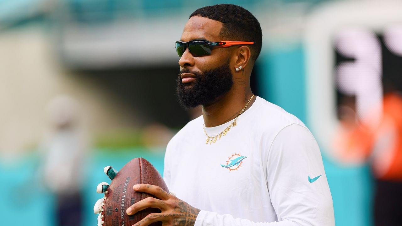 Miami Dolphins wide receiver Odell Beckham Jr. (3) throws the football before preseason game against the Washington Commanders at Hard Rock Stadium.