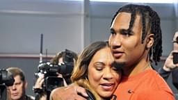 Ohio State quarterback C.J. Stroud hugs his mother, Kim, after his workout on the Buckeyes' pro day.