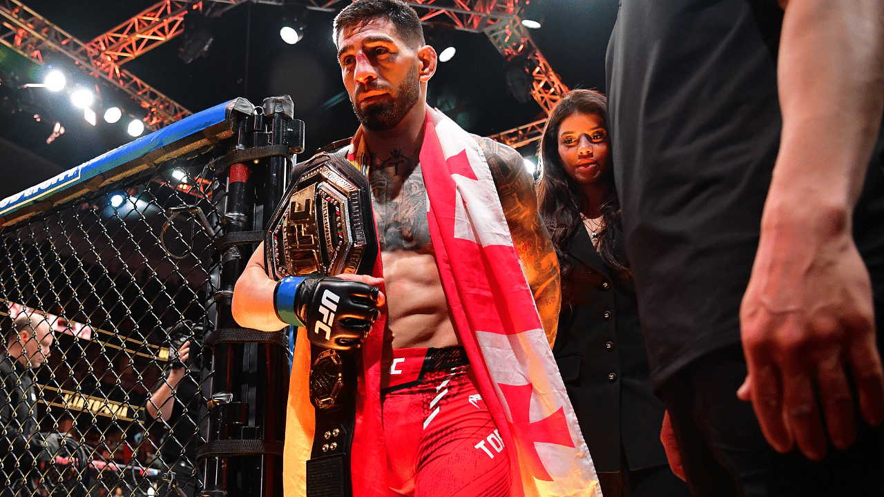 Ilia Topuria celebrates his championship victory against Alexander Volkanovski during UFC 298 at Honda Center.