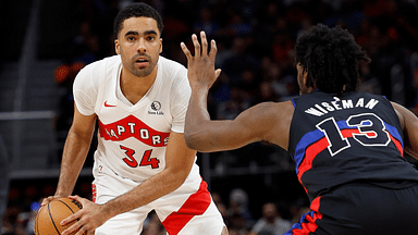 Toronto Raptors center Jontay Porter (34) is defended by Detroit Pistons center James Wiseman (13) in the second half at Little Caesars Arena.