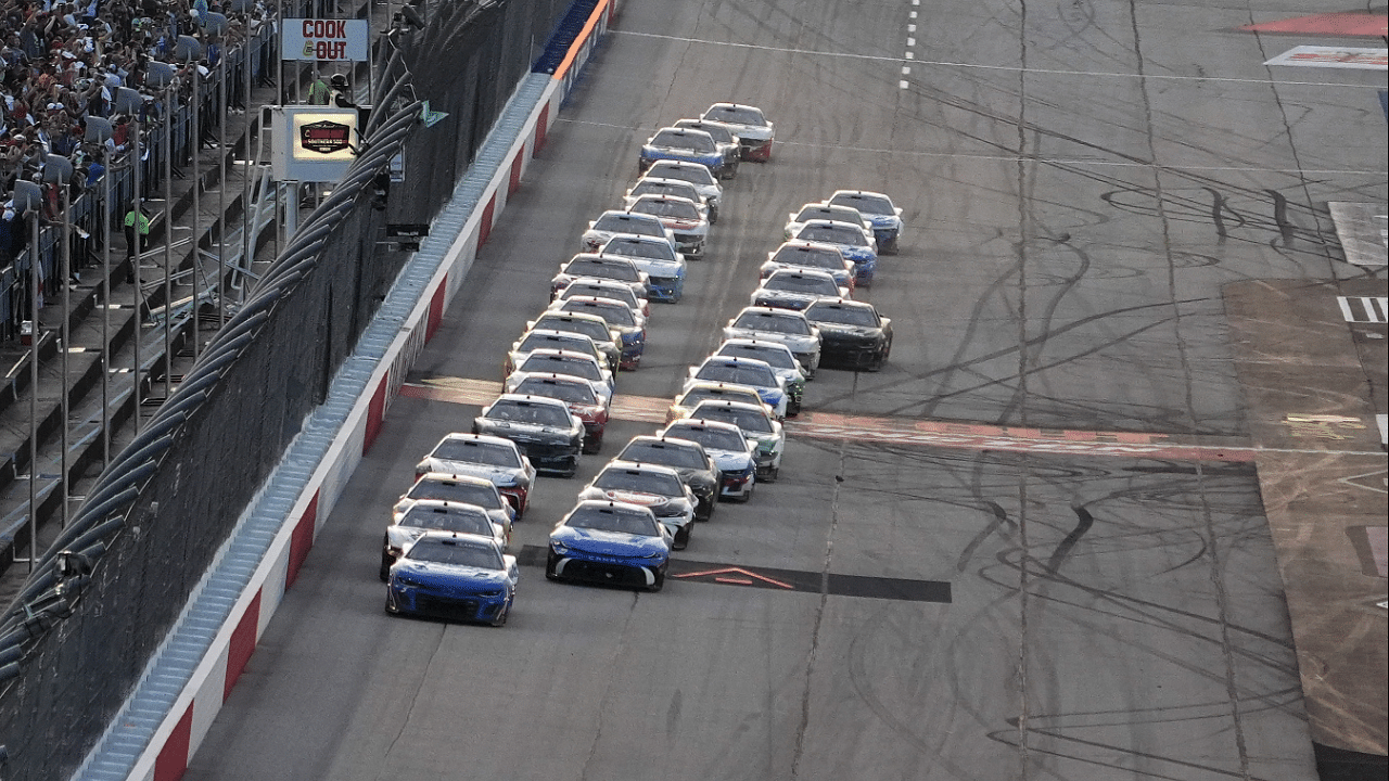 NASCAR Cup Series driver Kyle Larson (5) and NASCAR Cup Series driver Bubba Wallace (23) lead the field to restart the Cook Out Southern 500 at Darlington Raceway.