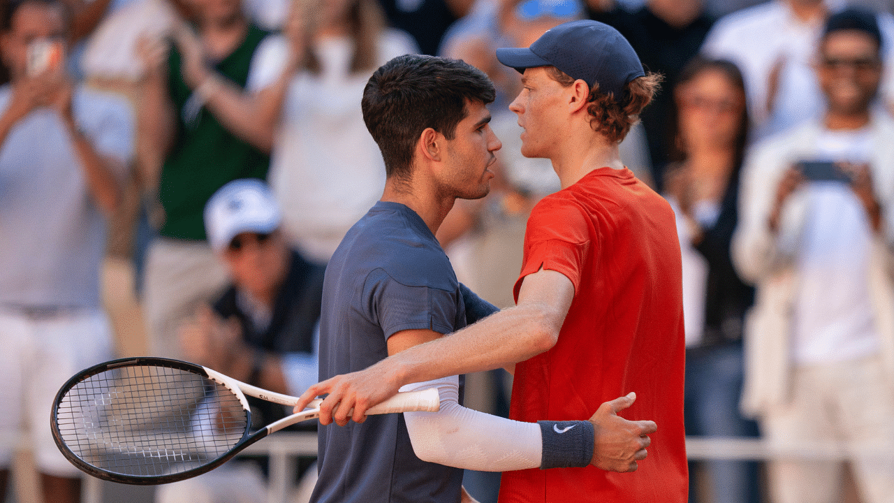 Carlos Alcaraz of Spain and Jannik Sinner of Italy of Italy after their match on day 13 of Roland Garros at Stade Roland Garros.