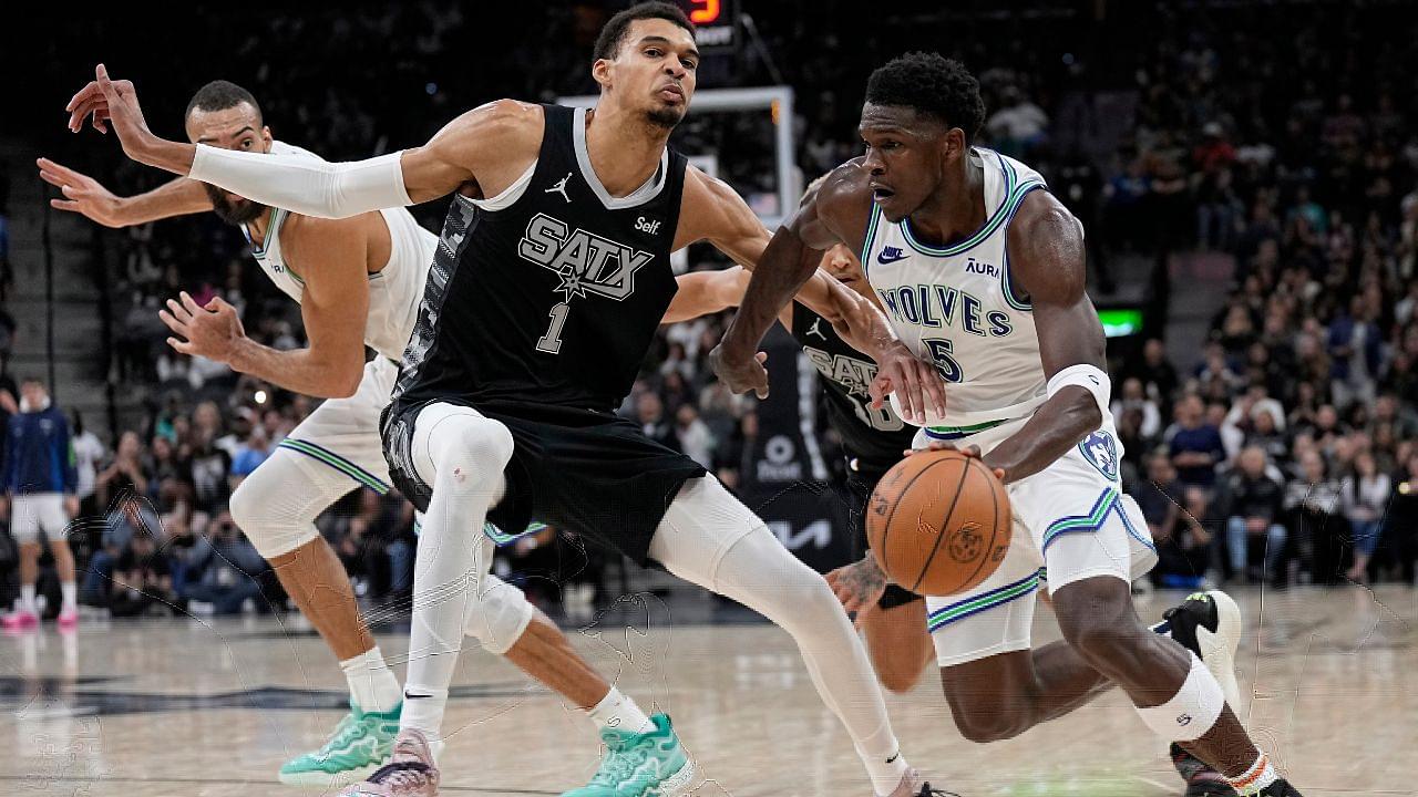 Minnesota Timberwolves guard Anthony Edwards (5) drives to the basket against San Antonio Spurs forward Victor Wembanyama (1) during the second half at Frost Bank Center.