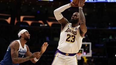 Lakers forward LeBron James (23) shoots the ball over Minnesota Timberwolves guard Nickeil Alexander-Walker (9) during the second quarter at Crypto.com Arena.