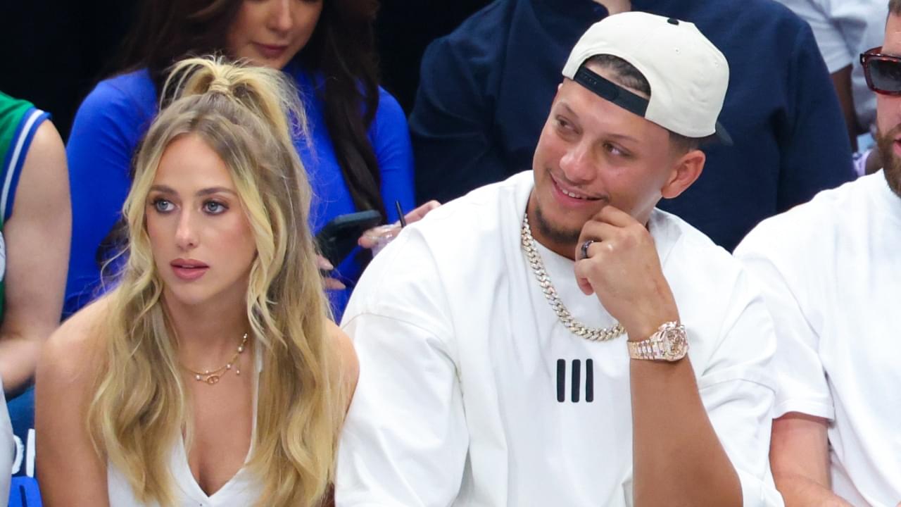 May 26, 2024; Dallas, Texas, USA; Kansas City Chiefs quarterback Patrick Mahomes II sits with his wife Brittany and tight end Travis Kelce during the game between the Dallas Mavericks and Minnesota Timberwolves during game three of the western conference finals for the 2024 NBA playoffs at American Airlines Center.