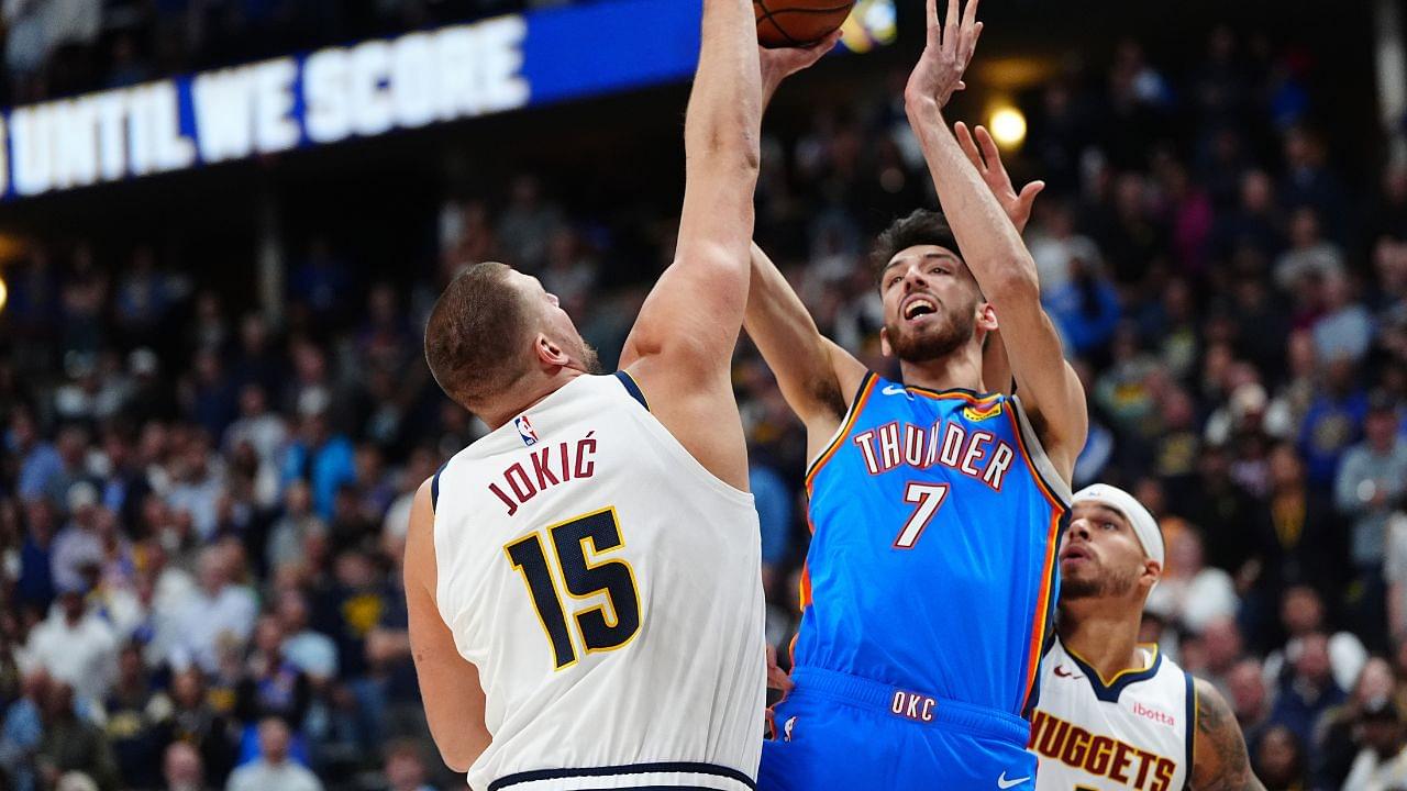 Denver Nuggets center Nikola Jokic (15) defends on Oklahoma City Thunder forward Chet Holmgren (7) in the first quarter at Ball Arena.