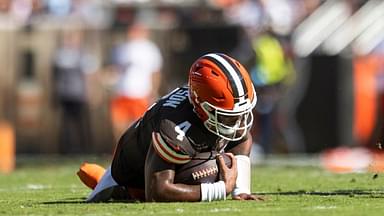 Cleveland Browns quarterback Deshaun Watson (4) falls to the ground with a torn Achilles during the second quarter against the Cincinnati Bengals at Huntington Bank Field