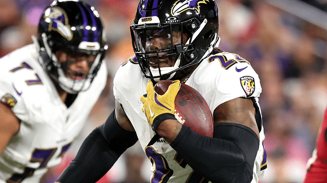 Baltimore Ravens running back Derrick Henry (22) runs with the ball against the Tampa Bay Buccaneers during the first half at Raymond James Stadium.