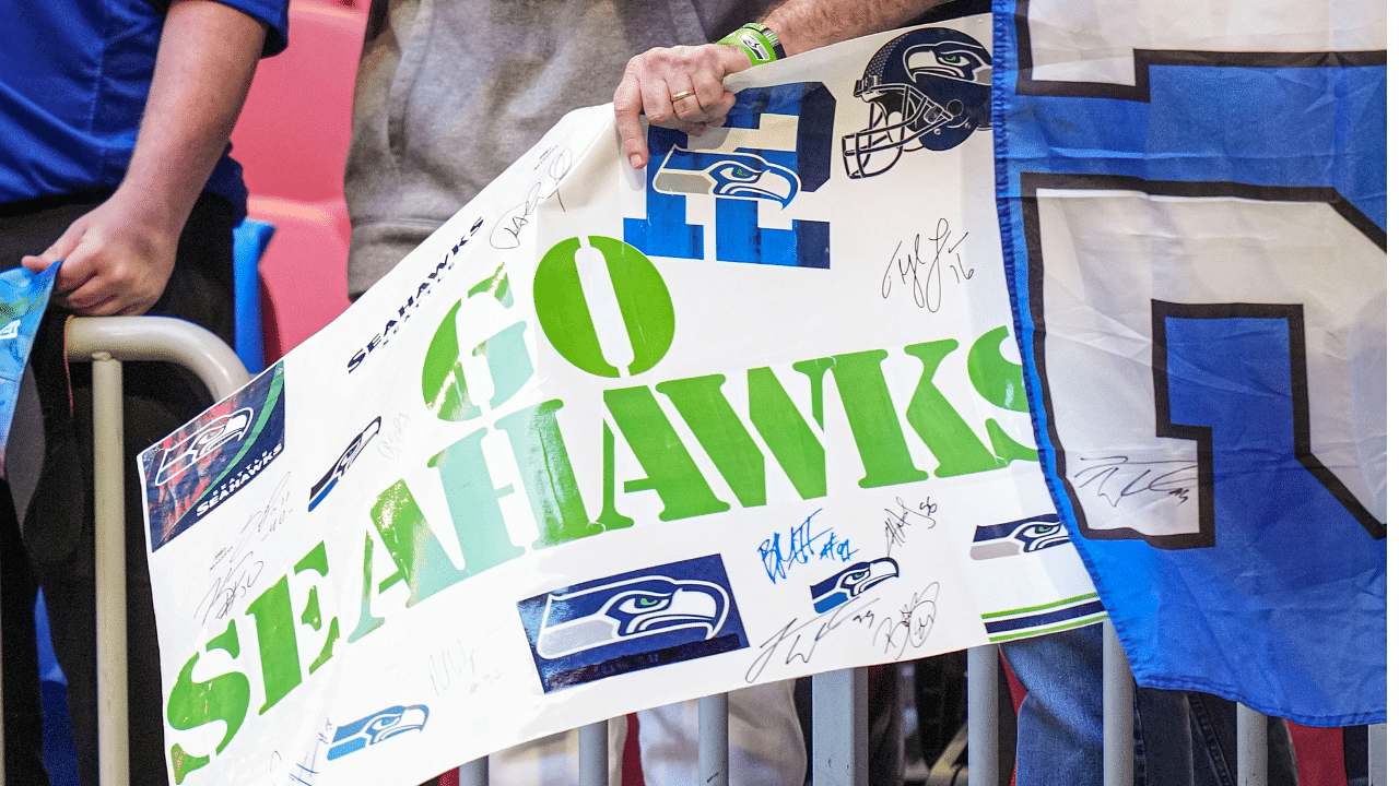 A Seattle Seahawks fans reacts to his team entering the field before the game against the Atlanta Falcons at Mercedes-Benz Stadium.