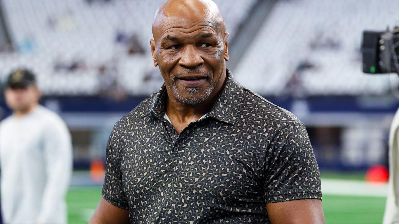 ; Boxer Mike Tyson on the field before the game between the Dallas Cowboys and New Orleans Saints at AT&T Stadium