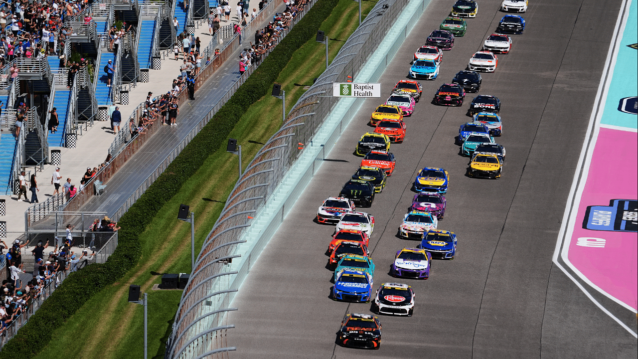 NASCAR Cup Series driver Christopher Bell (20) and NASCAR Cup Series driver Tyler Reddick (45) race ahead of NASCAR Cup Series driver Kyle Larson (5) during the Straight Talk Wireless 400 at Homestead-Miami Speedway.