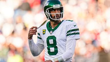 Oct 27, 2024; Foxborough, Massachusetts, USA; New York Jets quarterback Aaron Rodgers (8) on the field against the New England Patriots in the second half at Gillette Stadium.