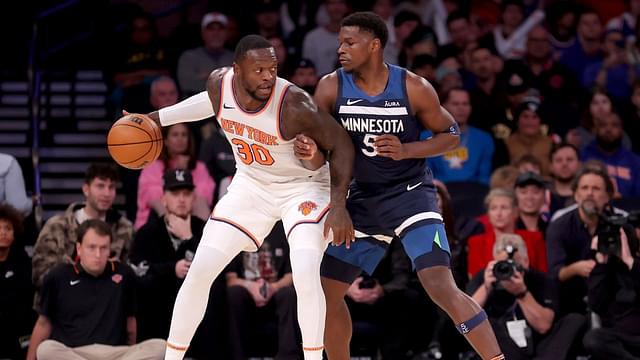 New York Knicks forward Julius Randle (30) controls the ball against Minnesota Timberwolves guard Anthony Edwards (5) during the first quarter at Madison Square Garden