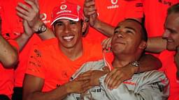 Lewis Hamilton (England McLaren Mercedes, left) celebrates his world championship title together with brother Nicholas Motorsport Grand Prix Men's Brazilian Grand Prix 2008