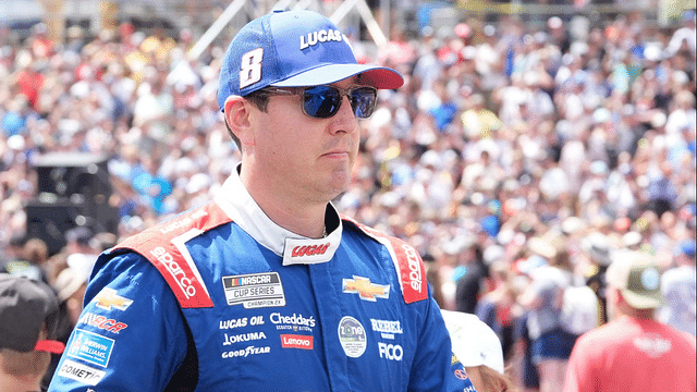 Kyle Busch walks to his car during Sunday's pre-race for the NASCAR Cup Series FireKeepers Casino 400 at Michigan International Speedway.