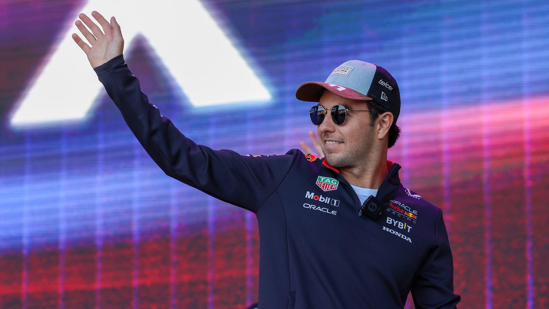 AUSTIN, TX - OCTOBER 19: Oracle Red Bull Racing driver Sergio Perez (11) of Mexico waives to fans as he leaves the Fan Forum before the Sprint Race of the Formula 1 Pirelli United States Grand Prix on October 19, 2024, at Circuit of The Americas in Austin, Texas.