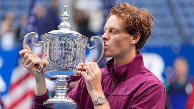 Jannik Sinner (ITA) celebrates with the trophy after defeating Taylor Fritz (USA) in the men’s singles final of the 2024 US Open