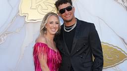 Kansas City Chiefs quarterback Patrick Mahomes and wife Brittany pose for a photo on the red carpet at the Nelson Art Gallery.