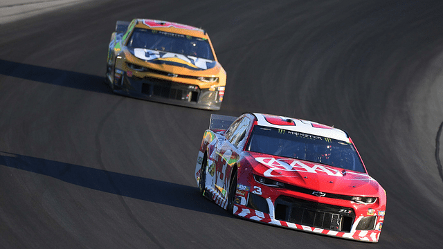 Monster Energy NASCAR Cup Series driver Austin Dillon (3) leads Monster Energy NASCAR Cup Series driver Daniel Hemric (8) out of turn three during the Quaker State 400 by Walmart at Kentucky Speedway.