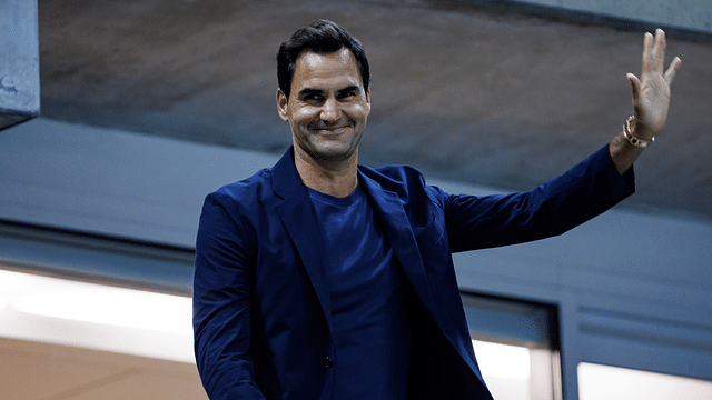 Roger Federer watches Aryna Sabalenka of Russia playing Qinwen Zheng of China on day nine of the U.S. Open tennis tournament