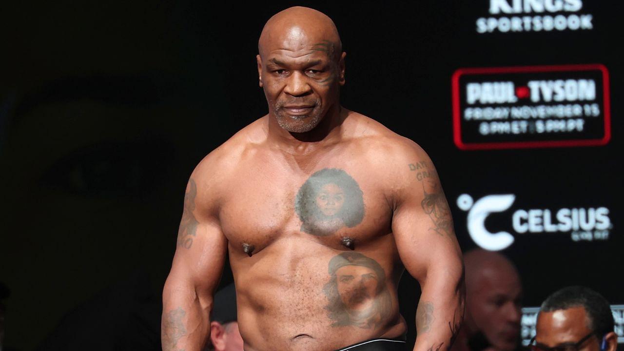 Mike Tyson weighs in the day before his fight against Jake Paul at the Toyota Music Factory.