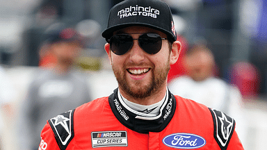 NASCAR Cup Series driver Chase Briscoe (14) walks down pit road during qualifying for the Geico 500 at Talladega Superspeedway.