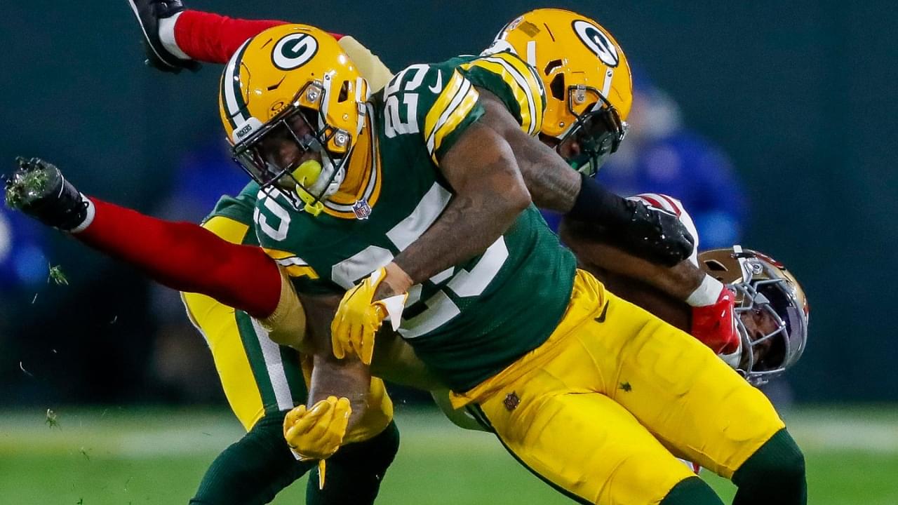 Green Bay Packers cornerback Keisean Nixon (25) tackles San Francisco 49ers wide receiver Jauan Jennings (15) on Sunday, November 24, 2024, at Lambeau Field in Green Bay, Wis. The Packers won the game, 38-10.