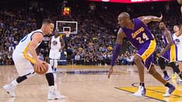 Golden State Warriors guard Stephen Curry (30, left) dribbles the basketball against Los Angeles Lakers forward Kobe Bryant (24) during the first quarter at Oracle Arena. The Warriors defeated the Lakers 116-98.