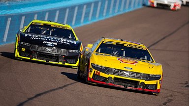 NASCAR Cup Series driver Joey Logano (22) leads teammate Ryan Blaney (12) during the NASCAR Cup Series Championship race at Phoenix Raceway.